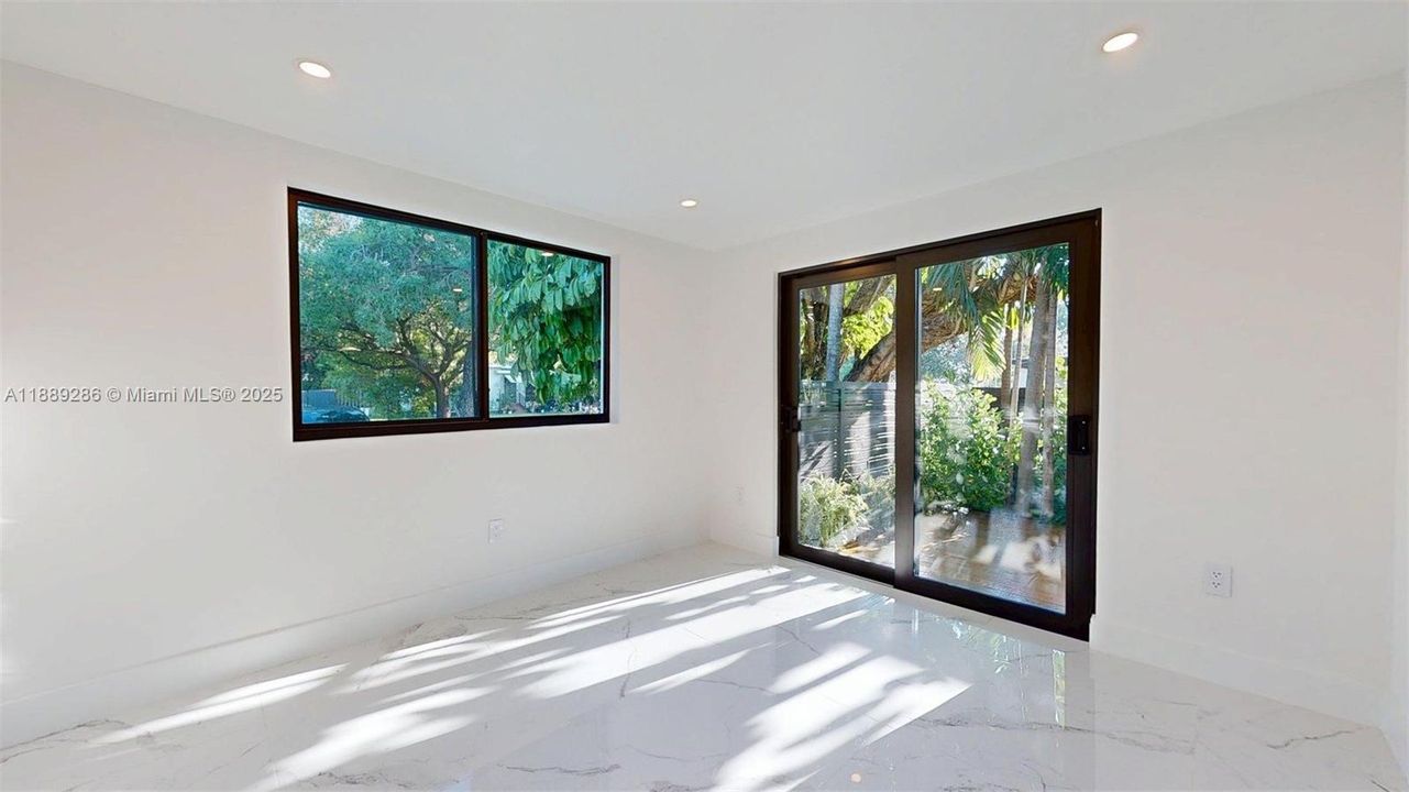 From the Primary, you can access to the private patio shared with the primary bathroom.  WOW!!!