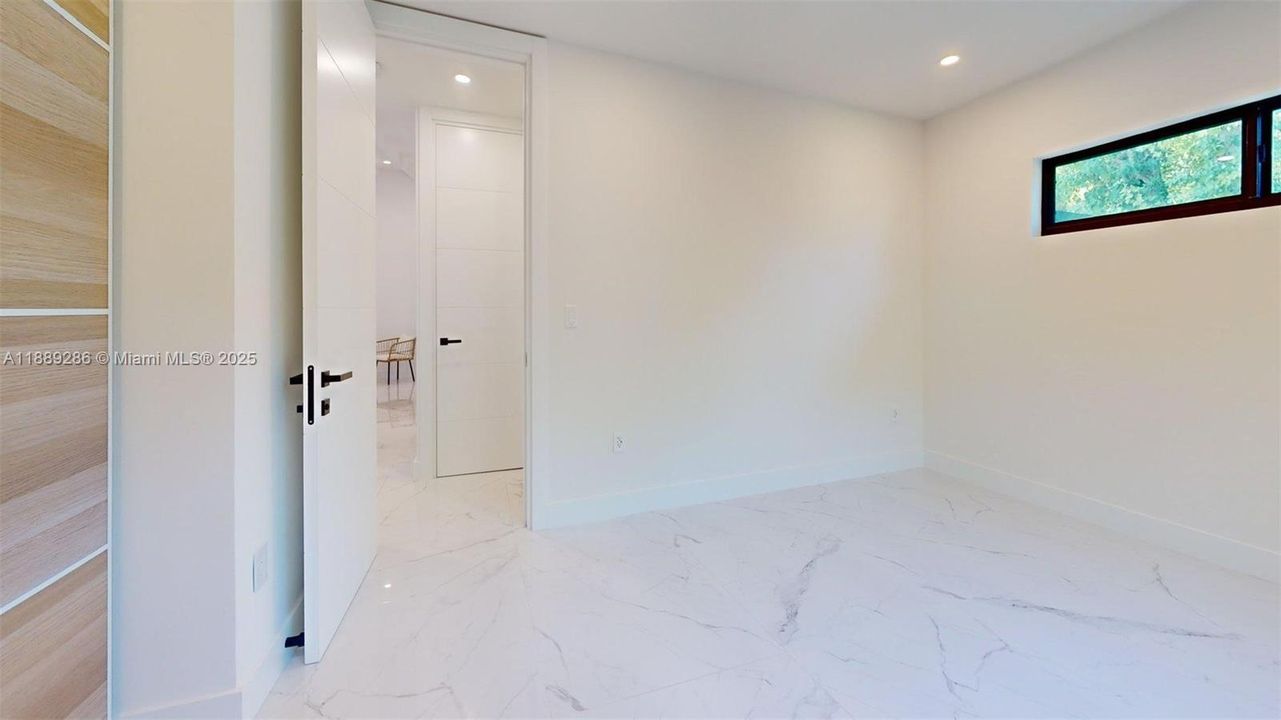 3rd Bedroom, NE Corner of the house, by the backyard deck