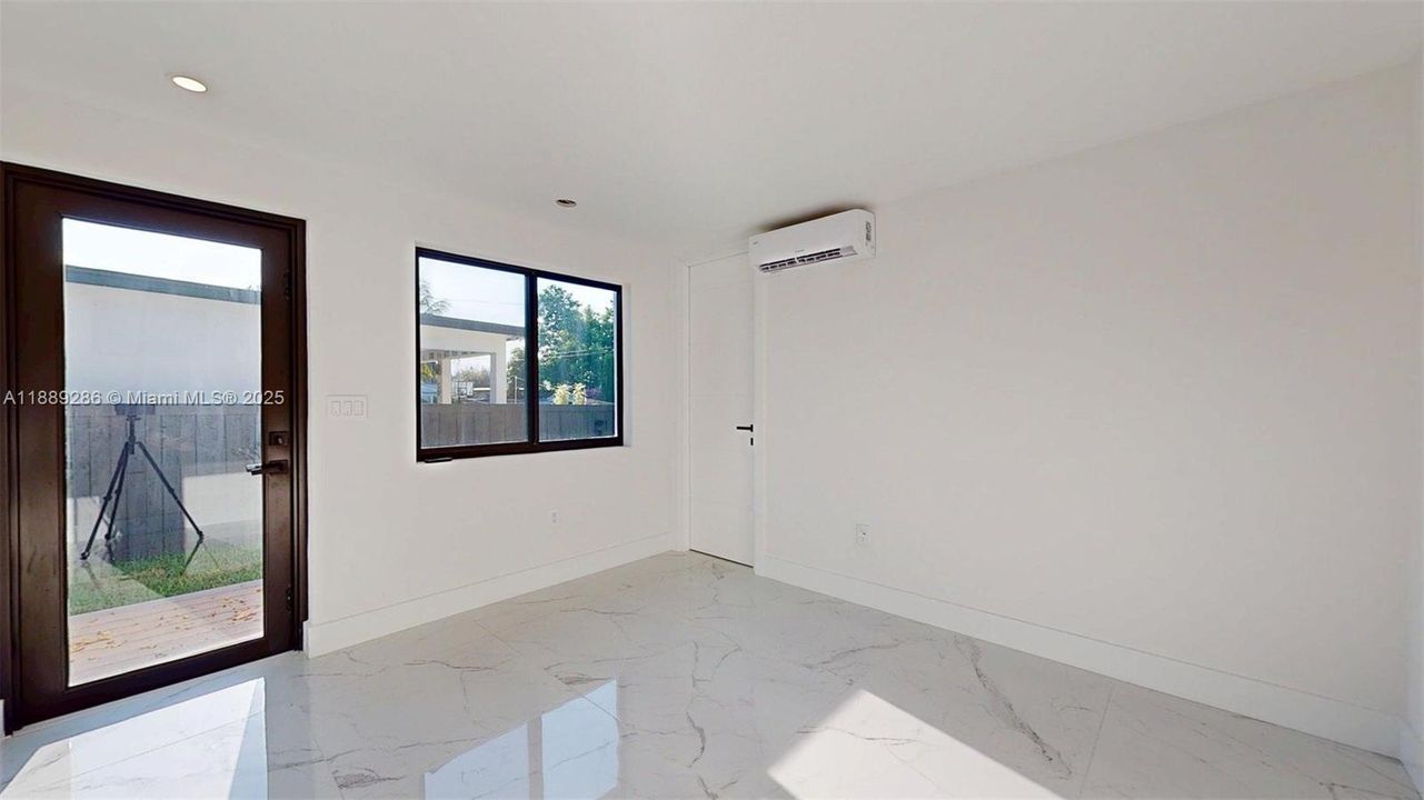 2nd Bedroom with private entrance, yard and bathroom.