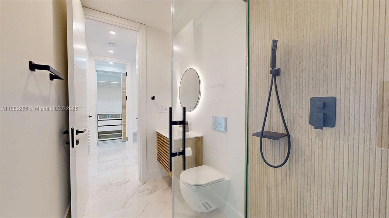 3rd Bathroom, by 3Rd Bedroom, with door to the outside patio, can be used as a "Cabana" Bathroom