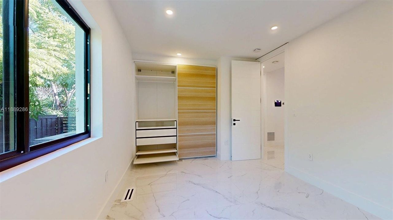 3rd Bedroom, NE Corner of the house, by the backyard deck