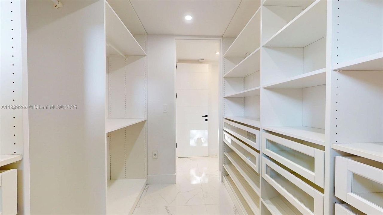 Spacious walk-in closet within the Primary Bedroom wing.