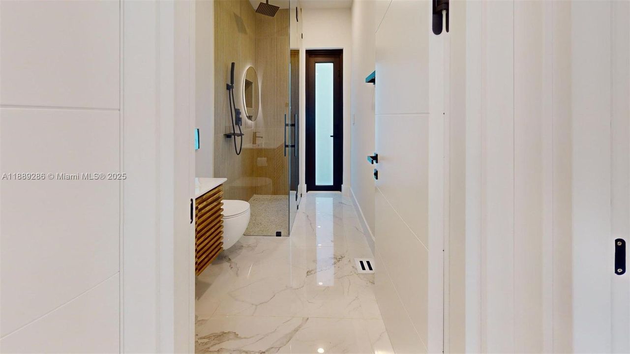 3rd Bathroom, by 3Rd Bedroom, with door to the outside patio, can be used as a "Cabana" Bathroom