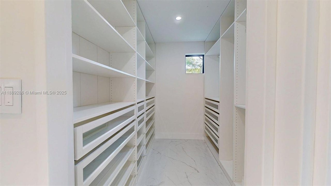 Spacious walk-in closet within the Primary Bedroom wing.