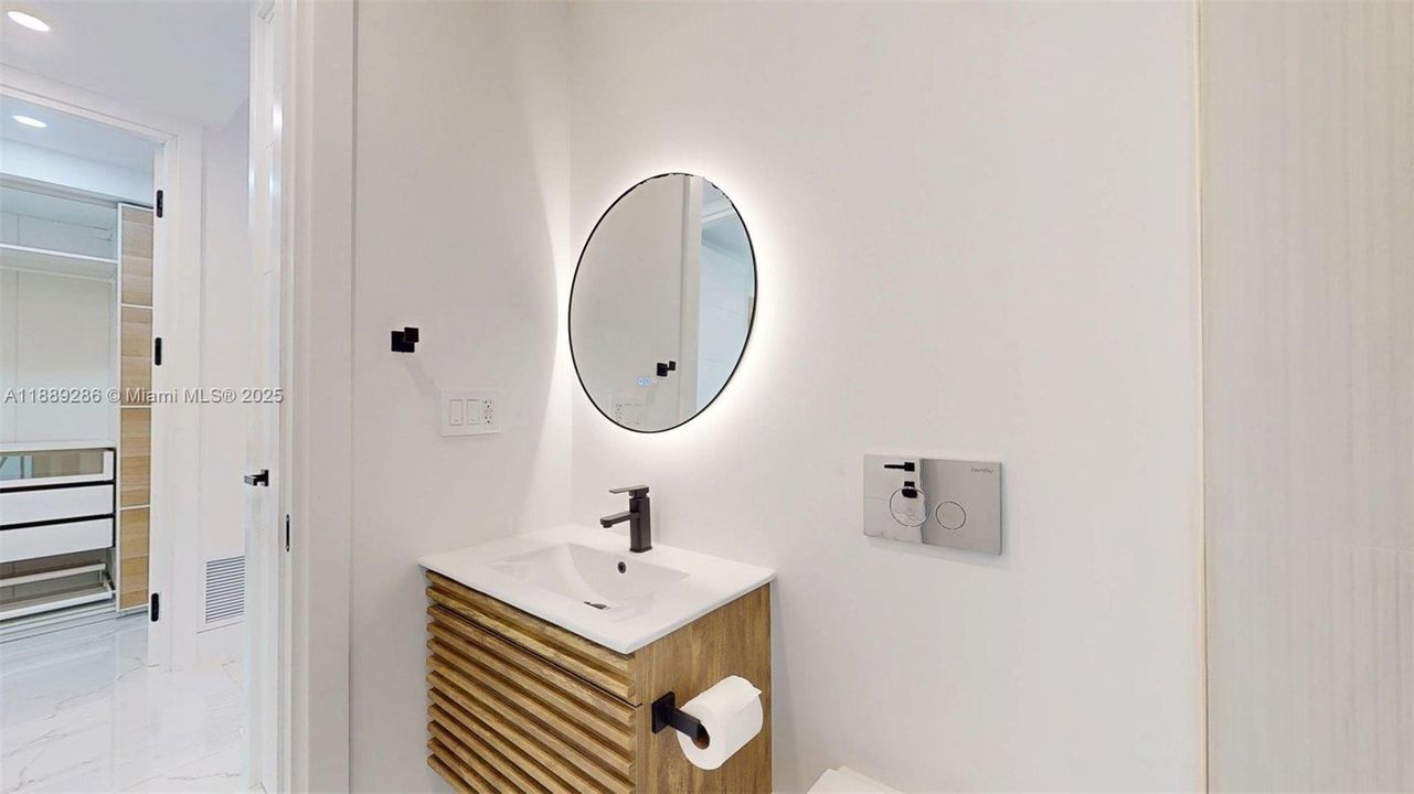 3rd Bathroom, by 3Rd Bedroom, with door to the outside patio, can be used as a "Cabana" Bathroom