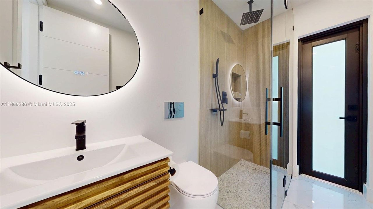 3rd Bathroom, by 3Rd Bedroom, with door to the outside patio, can be used as a "Cabana" Bathroom