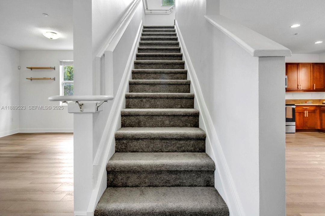 Stairs leading to bedrooms