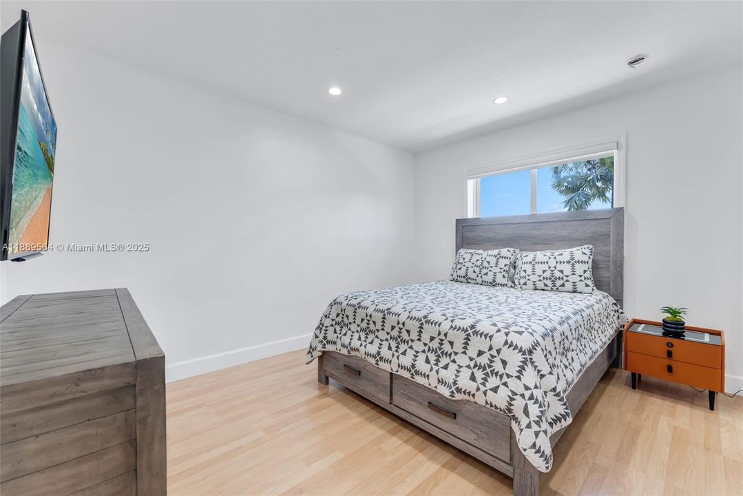 Spacious bedrooms featuring updated flooring, ceiling fans, and serene color palettes—ideal for family or guests.