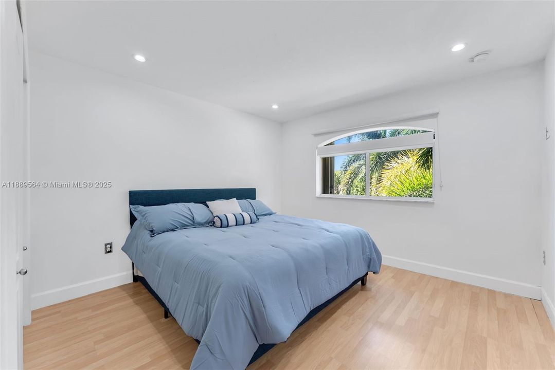 Spacious bedrooms featuring updated flooring, ceiling fans, and serene color palettes—ideal for family or guests.