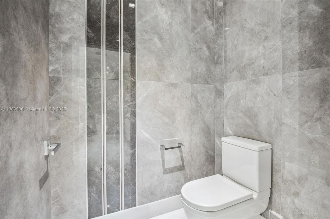 - Junior Suite Bathroom - Separate Enclosed Room for Toilet.