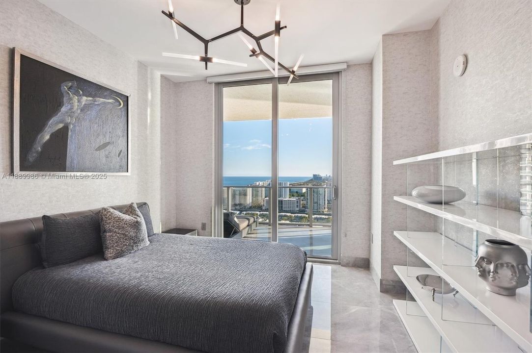 - 4th Bedroom - Furnished by Modloft and Habitus. Complete w/ Custom Built Out Double Sliding Door Closet. Access to the Balcony w/ Ocean & Intracoastal Views.
