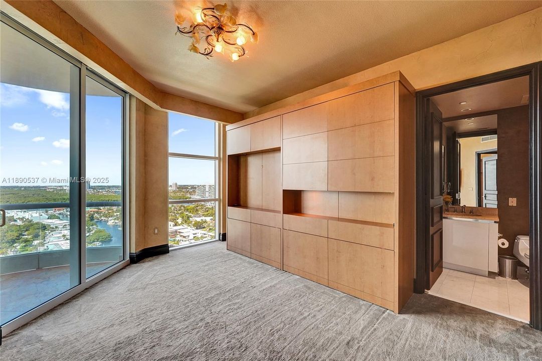 Murphy bed with built-ins. West city views and intracoastal water views