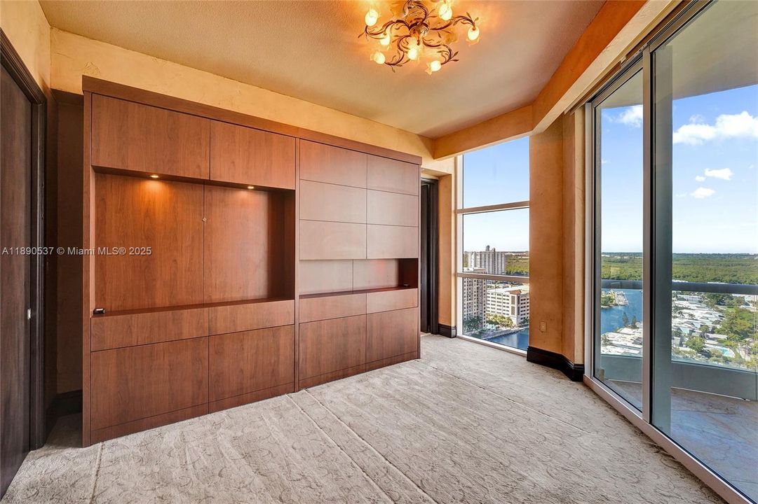 Bedroom with Murphy bed and built-ins......wake up to this gorgeous view of the city and water all around!