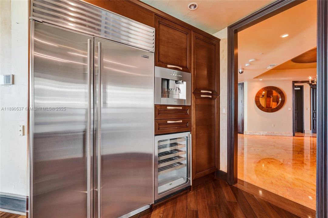 Sub zero refrigerator, microwave and wine cooler all on one wall for your convenience!  Plus, lots of cabinetry!