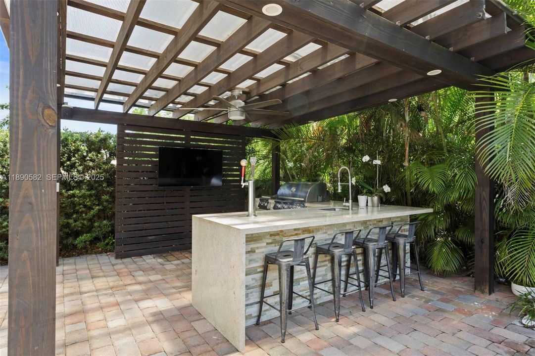 GAZEBO WITH BBQ  KEG and fridge.