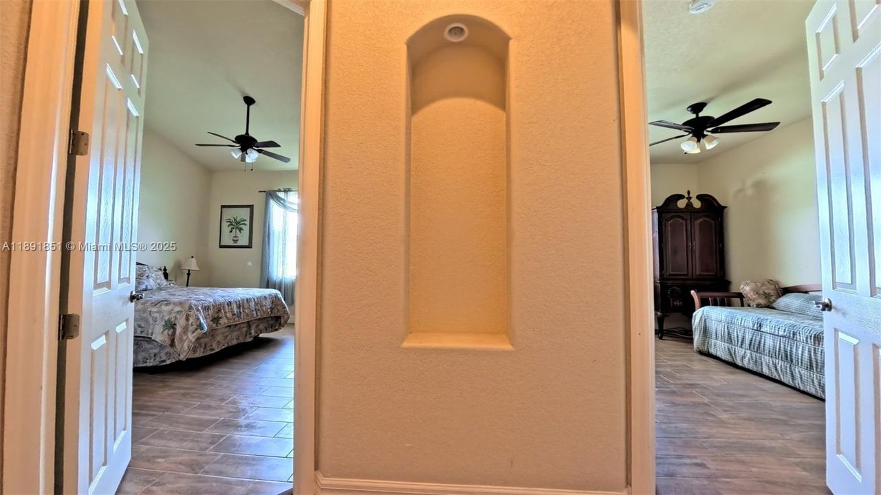 Jack & Jill guest bedrooms (bathroom in center)