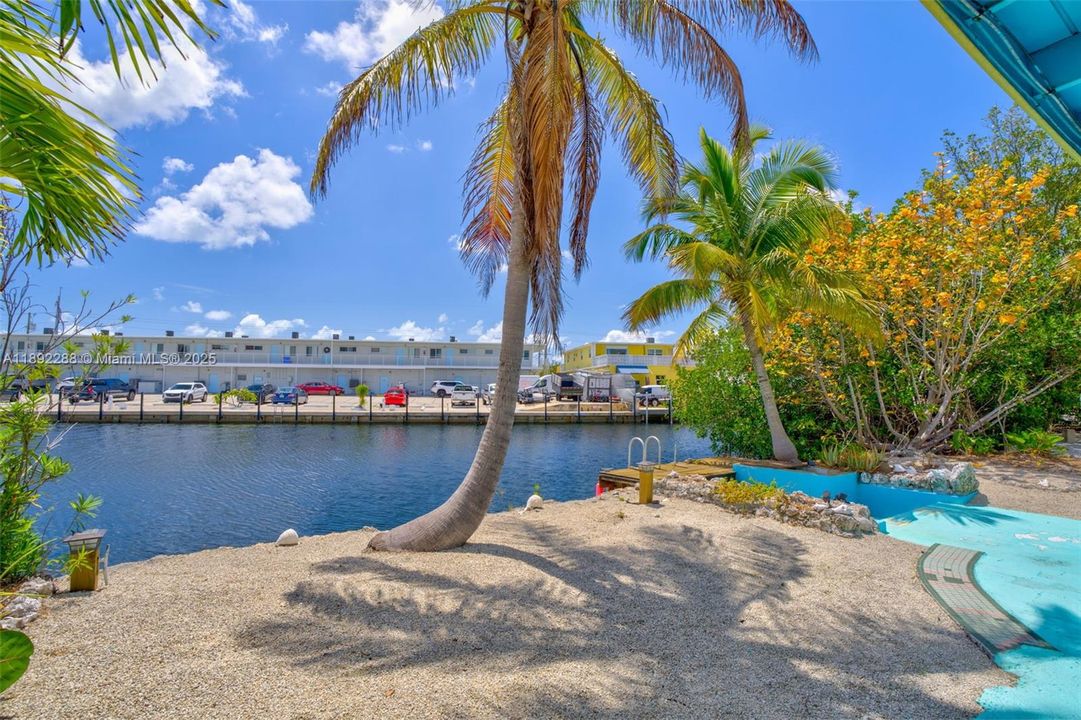 extra wide canalWide canal at the backyard with deep water at the seawall