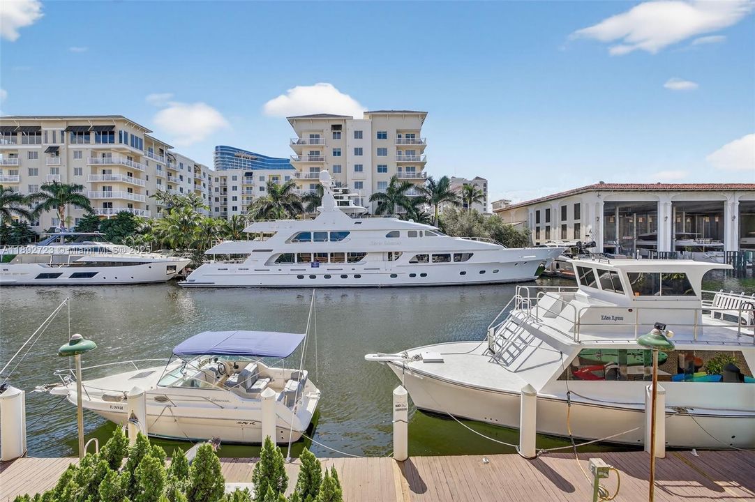 This is your view. Overlooking newly constructed luxury apartment buildings, 5 star convention center Omni hotel, hurricane protected boat storage faciity and mega yachts! Boat lovers take note: There is one dock space currently available for rent (fits a 20–21 ft boat) at $7 per foot.