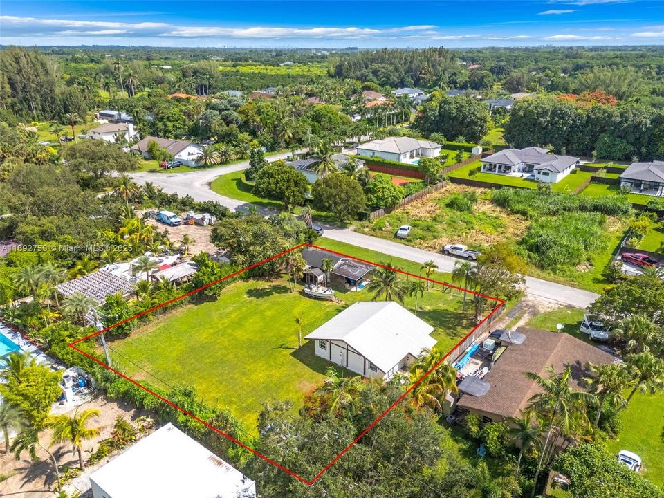 THE REAR AERIAL VIEW OF THE 1/4 ACRE. ROOM FOR A POOL. BRING YOUR CHICKENS! PLANT SOME FRUIT TREE'S