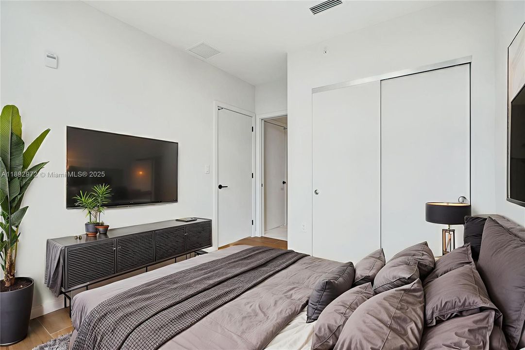 PRIMARY WITH PICTURESQUE CUT-OUT WINDOWS, DOUDLE SINKS, WALK IN CLOSETS.