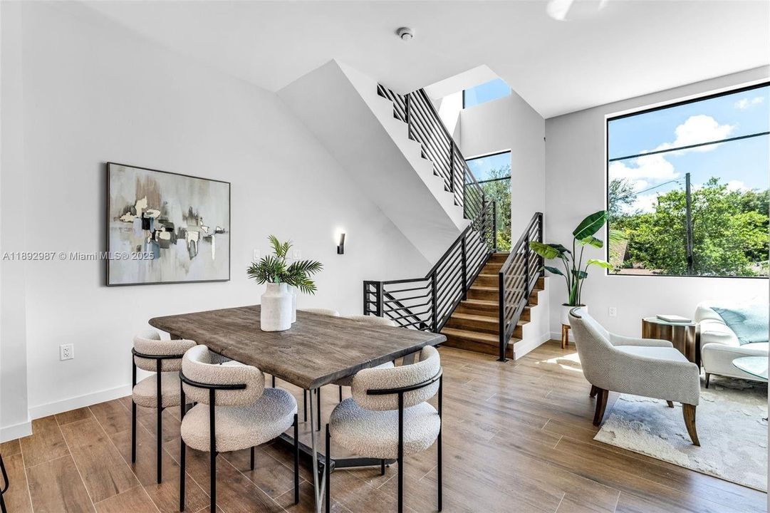 OPEN FLOOR PLAN CAN BE SET UP IN MULTIPLE WAYS. BREAKFAST BAR KITCHEN.