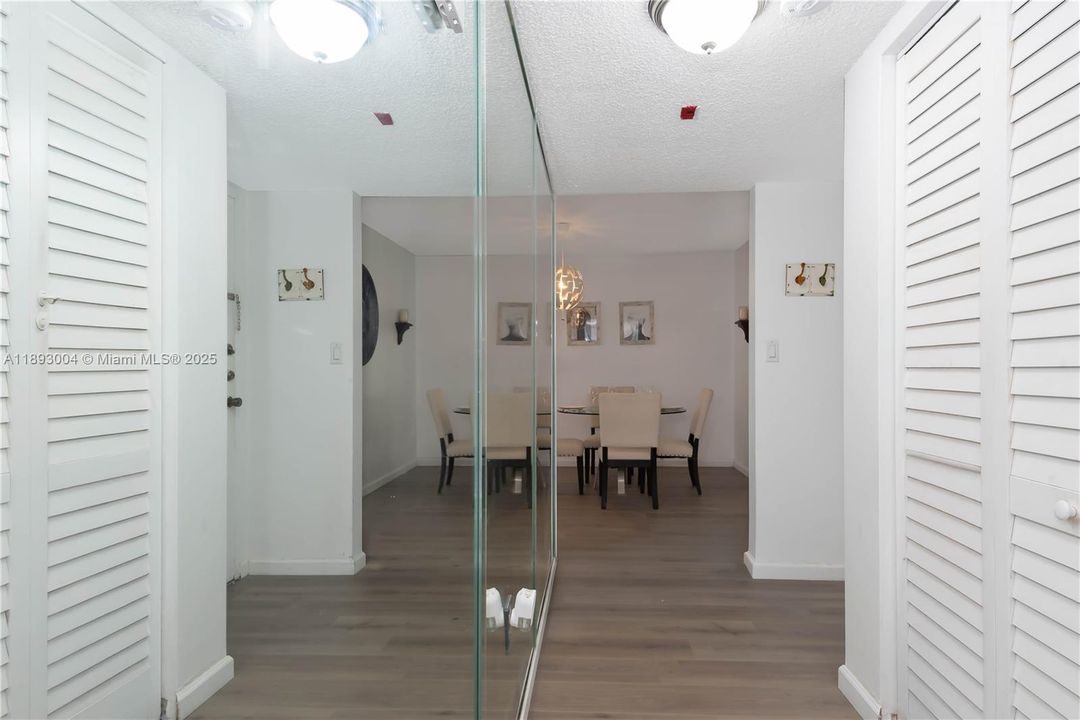 Hallway from dining room to guest bathroom and master beddroom