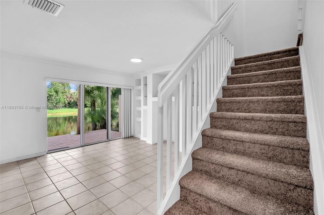 Living Room and stairs to second floor.