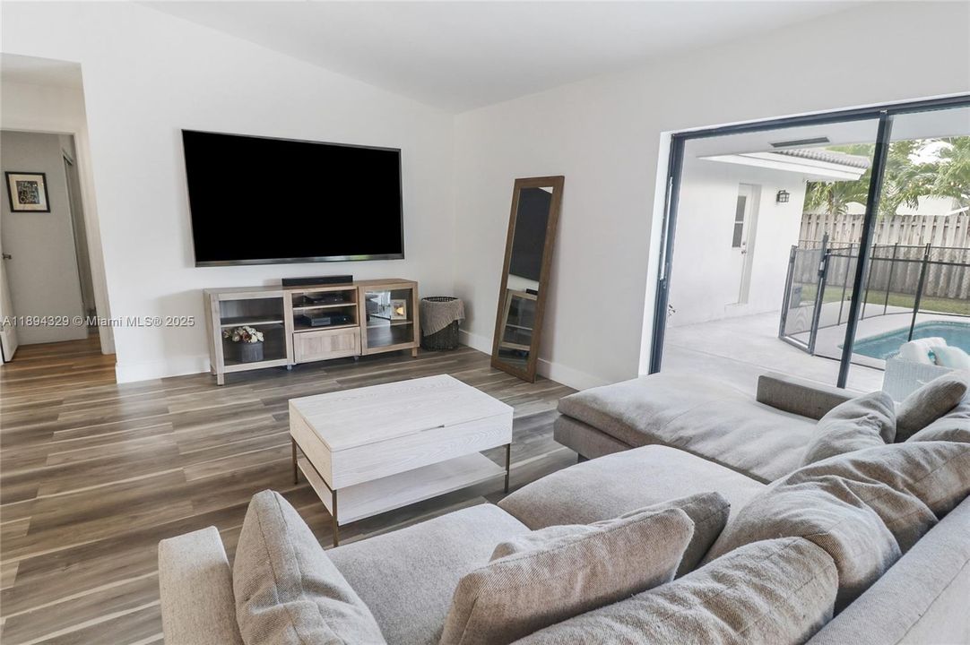 As you move past the dining and living areas toward the private quarters, you'll find the primary bedroom with its private bathroom, a second full bathroom, and three additional bedrooms. Make each room its own unique style, reflecting the personality and preferences of every member of the household.