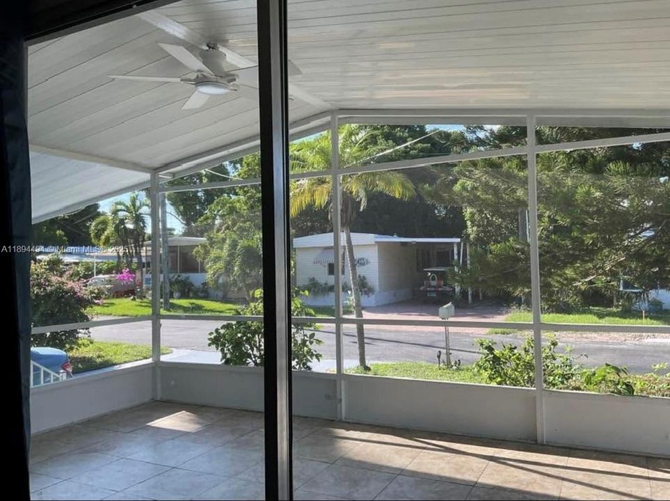 Porch enclosed and entry for the property for your guests, and it has a otherone directly to the kitchen side of the carport.
