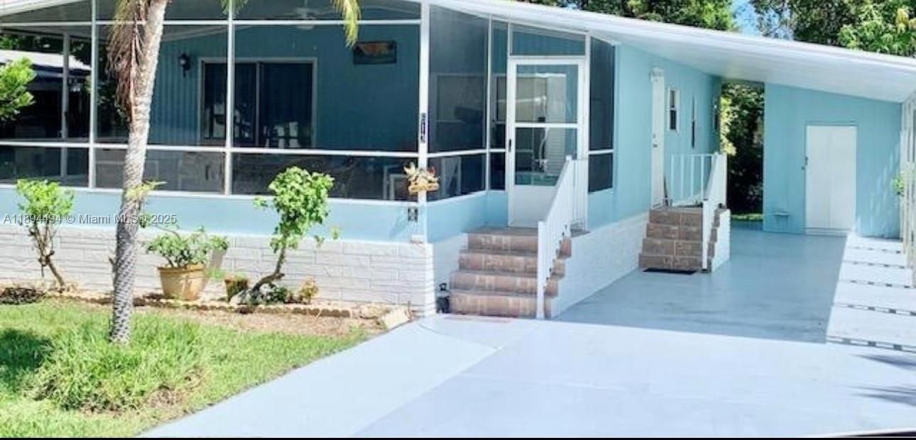 Carport for the two cars and the storage at the end.