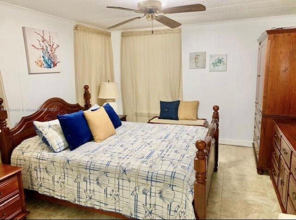 (This property is unfurnished). Just the picture you can see fit good the king size bedroom set.