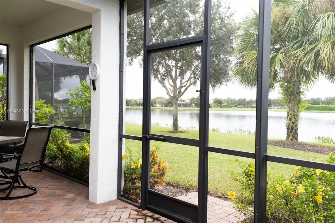 Spacious patio featuring a water view