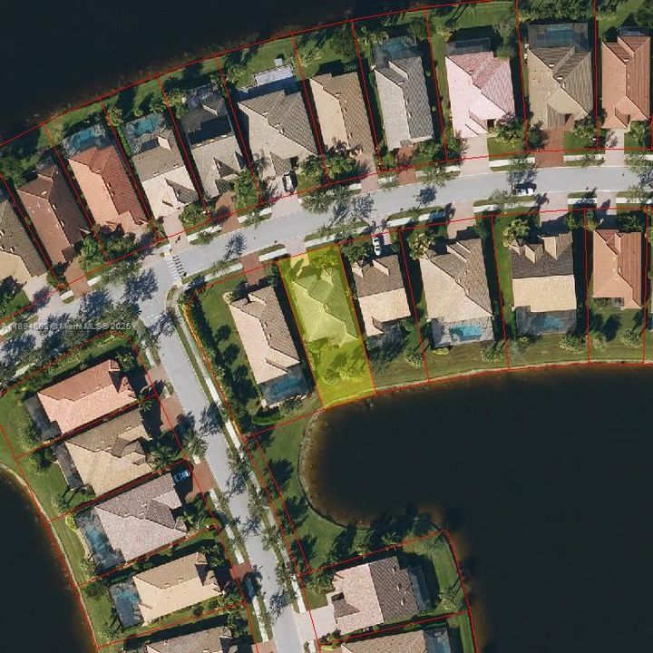 Aerial view of residential lot on water