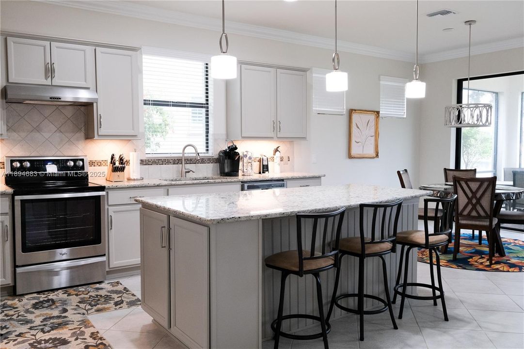 Eat-in Kitchen w/ center island storage, pendant lighting