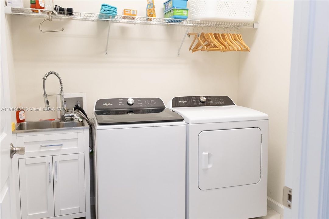Laundry room- large capacity W/D & sink