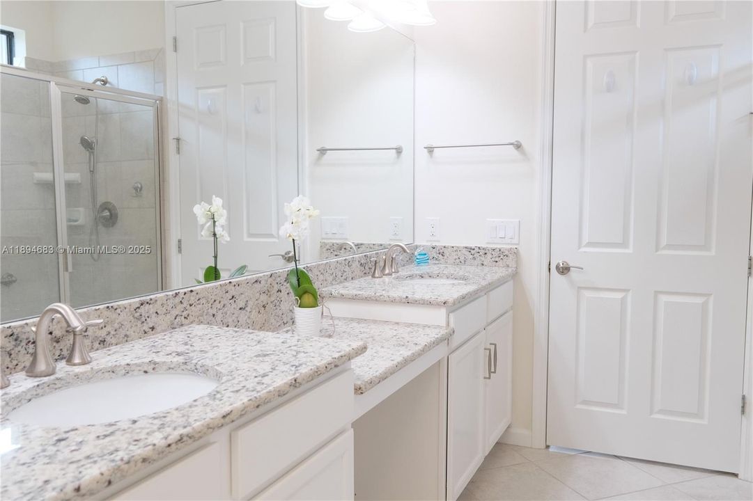 Master Bathroom Double Vanities, Tiled Shower, private toilet closet