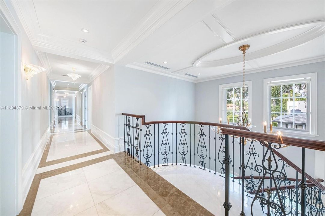 Upper gallery hallway serving six bedrooms