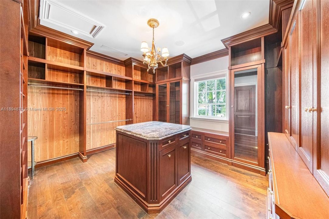 Two oversized walk-in closets off the primary bath, each with center island