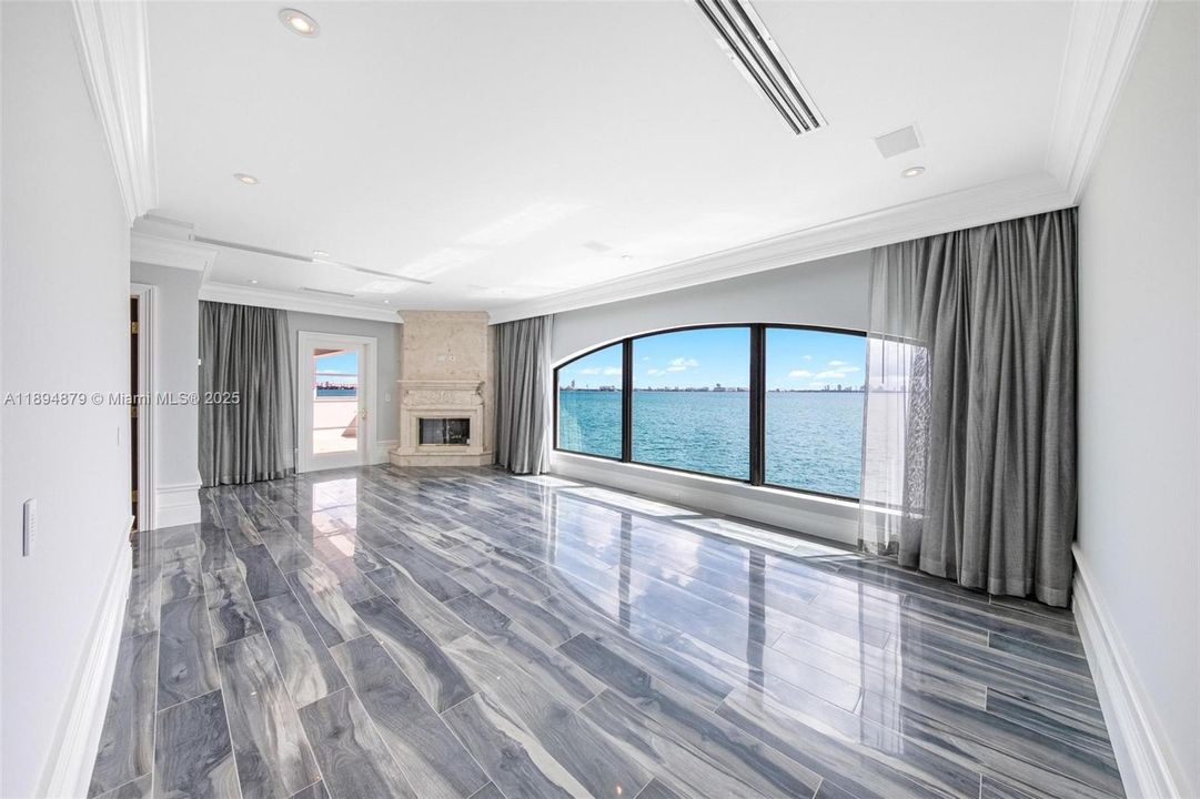 Primary suite opens to a private bay-view terrace