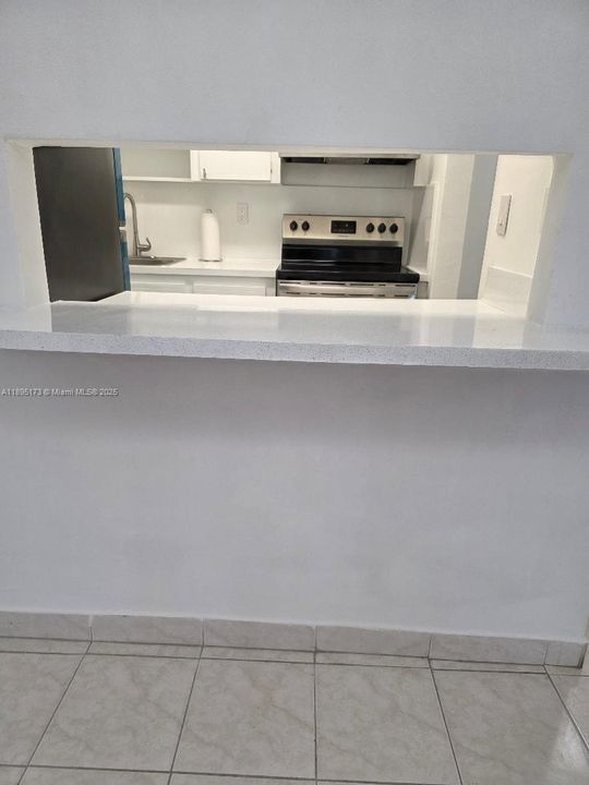 PASS THRU WINDOW FROM KITCHEN TO DINING AREA