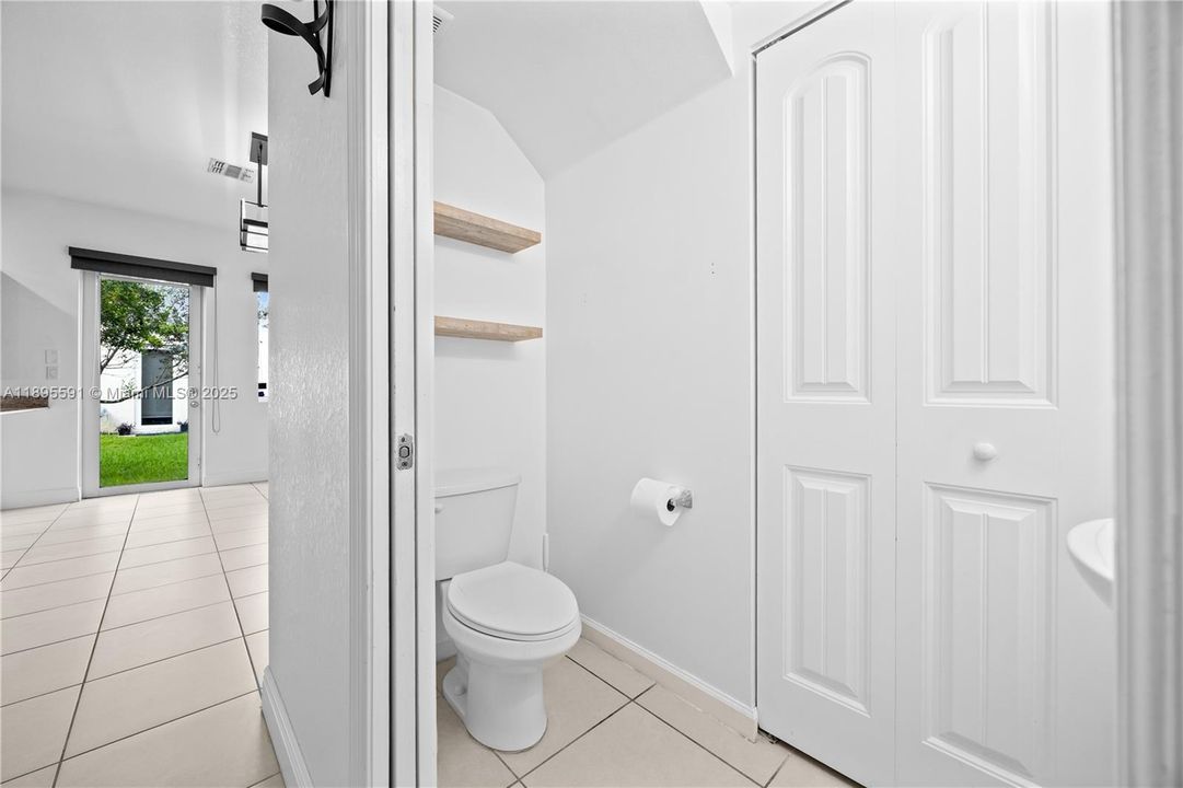 HALF BATHROOM W/ SMALL CLOSET