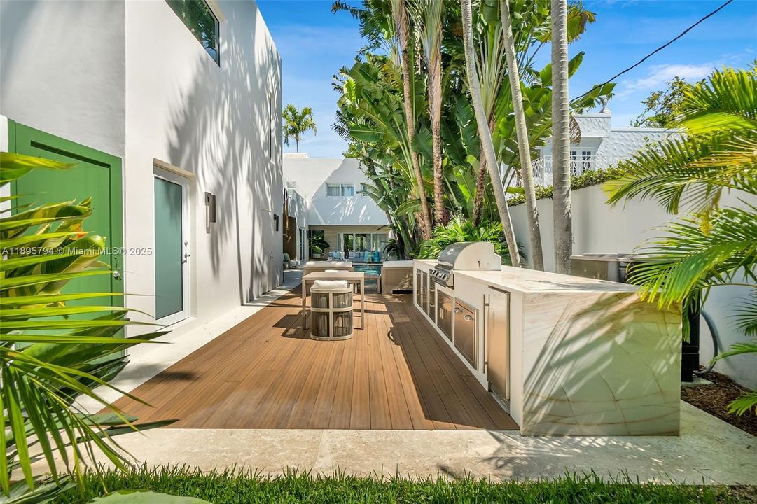 BBQ area, Guest house access, back gate