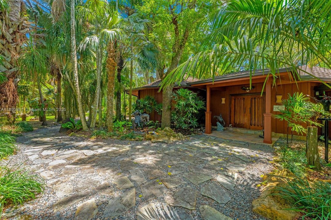 3,051 SQUARE FEET  UNDER A/C . ROTUNDAS (3) CUSTOM BUILT TO BRING NATURE INSIDE. THERE ARE 3 ROTUNDAS (CIRCULAR GLASS AND FIR  SHAPES UNITED BY LIVING AREAS. COVERED BREEZEWAYS/ PATIOS.  ALLOW FOR AN EASY FLOW....SEE FLOOR PLAN IN FOLLOWING PHOTO W CENTER AISLE BARN, OPEN AIR BARN PLUS..