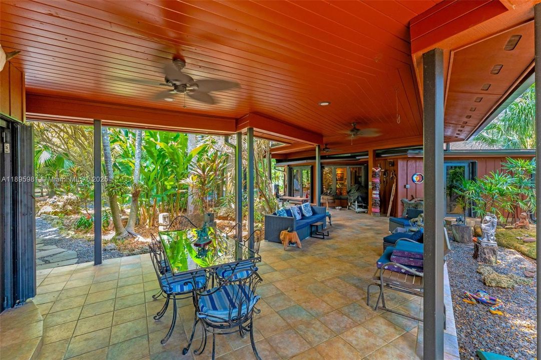 BREEZWAY OUTSIDE THE GUEST ROTUNDRA  WHCH IS 2/2 PLUS SITTING ROOM.