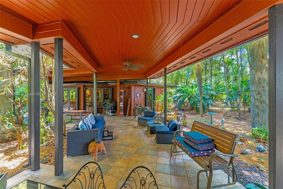 COVERED BREEZEWAY/PATIO LEADS FROM MAIN LIVING AREA (MASTER SUITE,LIVING, DINING ,OFFICE,2ND BATH, LAUNDRY/MUD,  CONNECTS FROM CHEF'S KITCHEN)LEADS TO THE 2/2  GUEST SUITES CONSIST OF / SITTING  PLUS 2/2  SUPER LAYOUT.