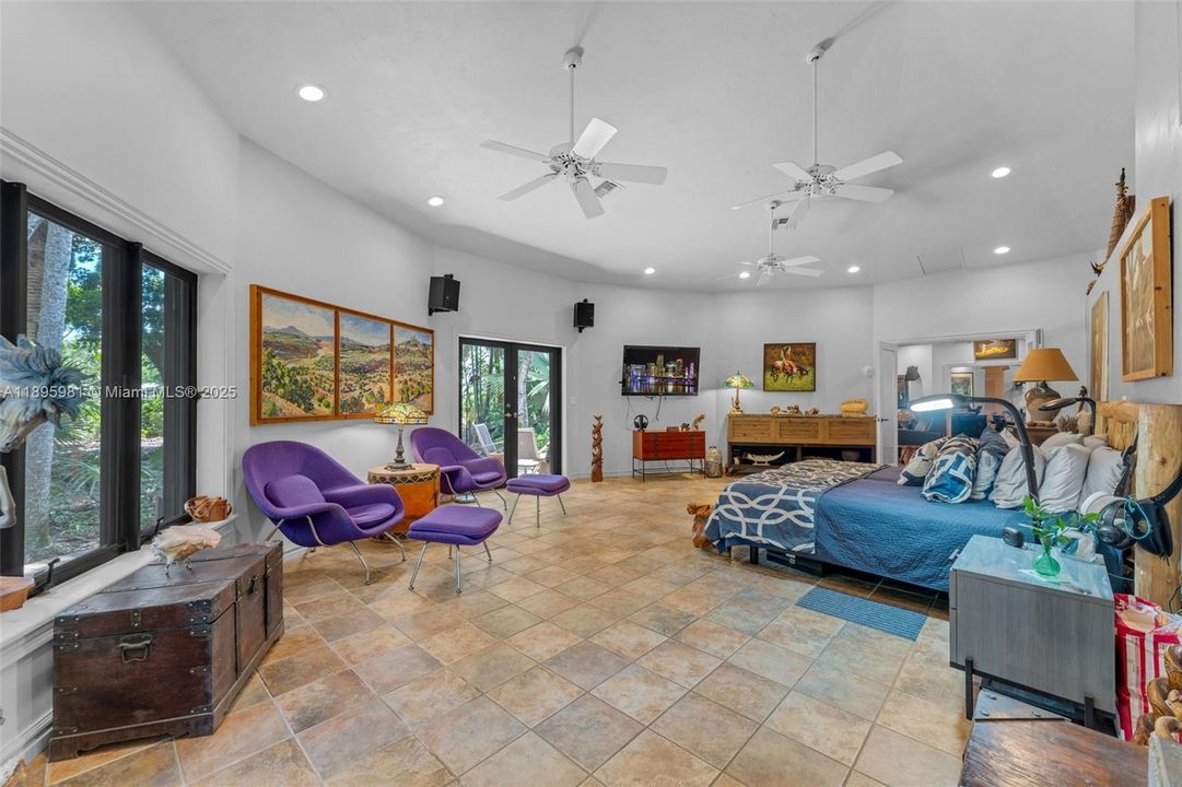 THE MAIN SUITE IS FURTHEST AWAY FROM KITCHEN, LOCATED ON THE EAST WING INSIDE MAIN POD. THE GUEST SUITE IS THE WEST WING ACCESSIBLE ONLY BY COVERED PATIO/BREEZEWAY.