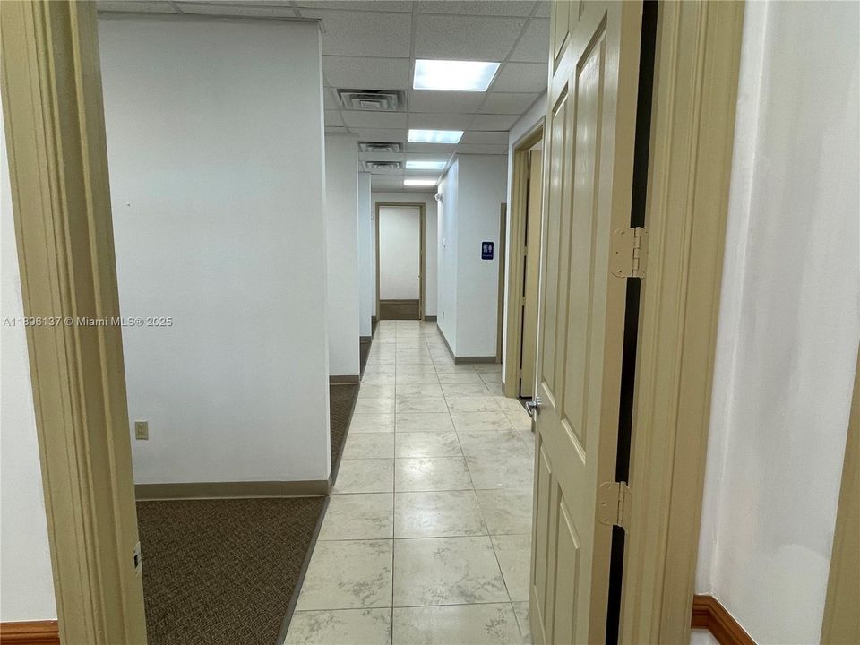 Hallway to offices.  View from reception area.
