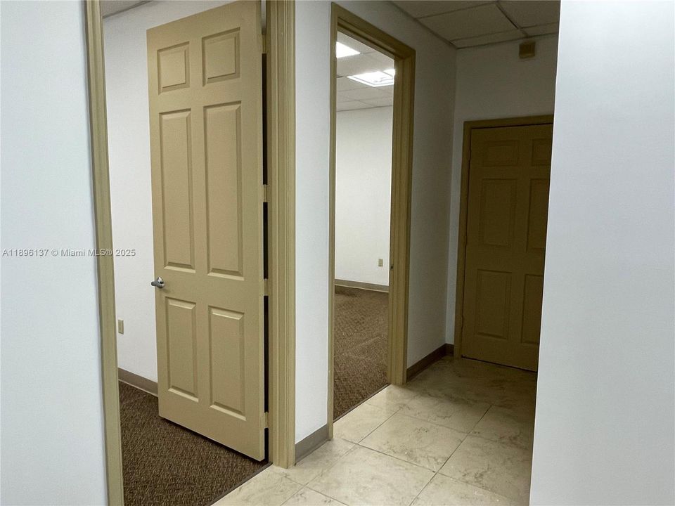Hallway to private offices in the back.
