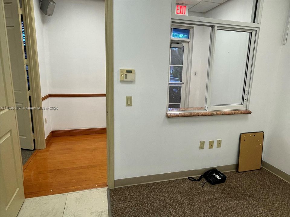 View to reception area from interior hallway