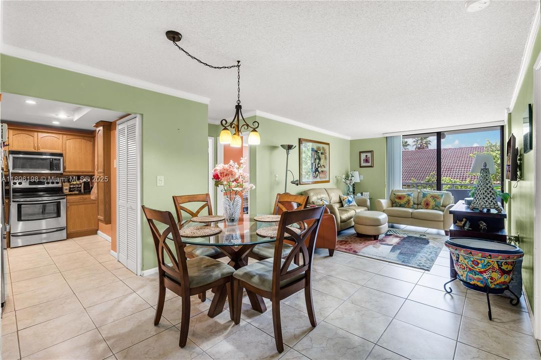 Open layout - Living room, balcony & kitchen